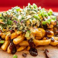 Detroit Loaded Fries · French fries topped with melted nacho cheese, smoked brisket, homemade BBQ sauce and spicy m...