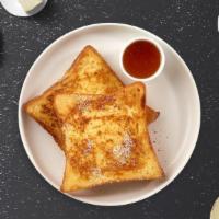 Cinnamon French Toast · Fresh bread battered in egg, milk, and cinnamon cooked until spongy and golden brown. Topped...