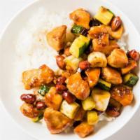 Kung Pao Chicken · Cooked in our very special hoisin sauce, mixed with crispy peanuts, and served with fresh ve...