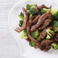 Beef With Broccoli · Steamy hot broccoli served with steamy hot beef served with white rice.