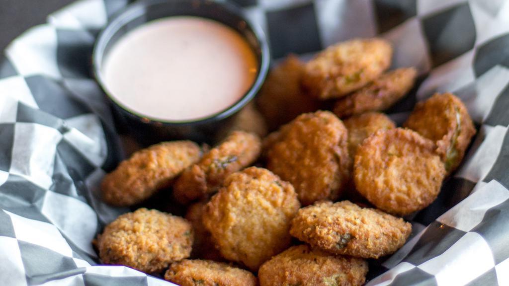 Golden Fried Pickles · Served with chipotle ranch.