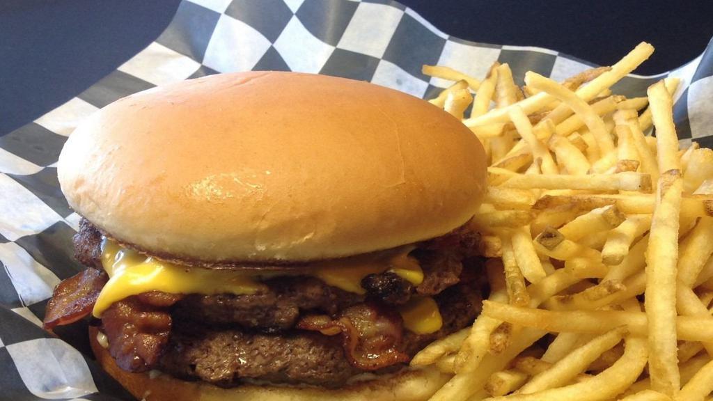 Double Down Burger · Double patty, double bacon, double American cheese, and mayo. Served with half a pound of golden fries.