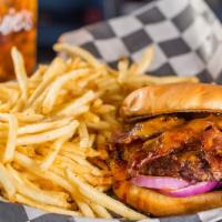 Prohibition Burger · Bacon, hickory bourbon sauce, cheddar jack cheese, and red onion. Served with half pound of ...