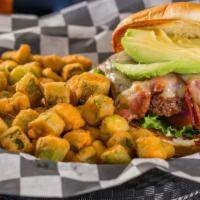 Avocado Burger · Bacon, mayo, lettuce, tomato, red onion, avocado, and Swiss cheese. Served with a half pound...