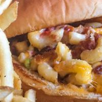 The Joker Burger · Spicy mac and cheese, bacon, and cheddar Jack cheese. Served with half a pound of golden fri...