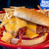 Brew Burger · Bacon, Beer Cheese, Tomato, Red Onion. Served with a half pound of golden fries.