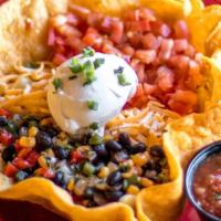 Taco Salad · Shredded chicken or ground beef, pinto beans, cheddar Jack cheese, tomatoes, black bean sals...