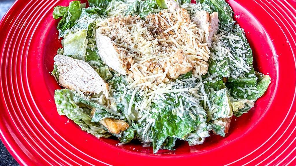 Chicken Caesar Salad · Grilled Chicken, Romaine Lettuce, Caesar Dressing, Parmesan Cheese, Croutons