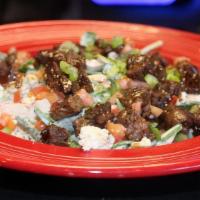 Drunken Steakhouse Salad · Spinach, mushrooms, bleu cheese crumbles, hickory bourbon skirt steak, tomatoes, chives, ble...