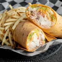 Turkey Chicken Club Wrap · Grilled chicken, shaved turkey, bacon, cheddar Jack cheese, tomatoes, mixed greens, ranch dr...