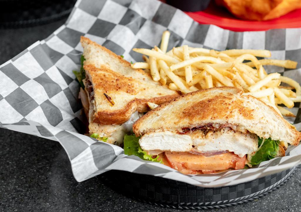 Grilled Chicken Sandwich · Grilled chicken, bacon, Swiss cheese, lettuce, tomato, red onion, chipotle honey mustard, toasted wheatberry bread. Served with 1/2 lb. golden fries.