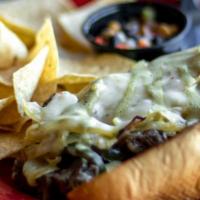 El Diablo Sandwich · Skirt steak, grilled jalapeños and onions, pepper jack cheese, spicy crema on toasted baguet...
