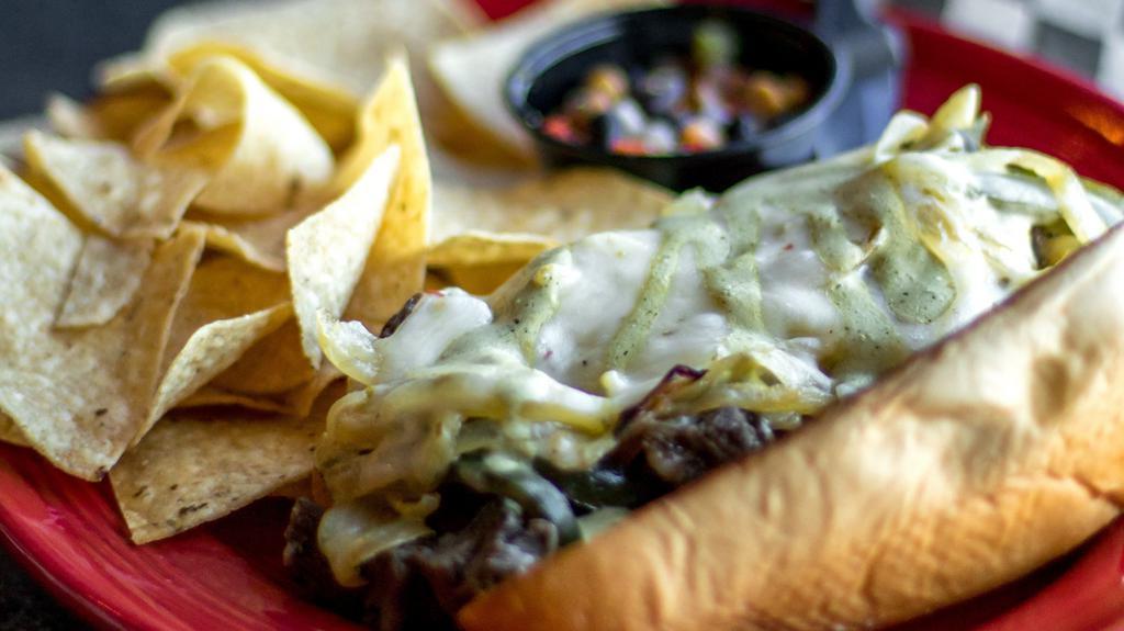 El Diablo Sandwich · Skirt steak, grilled jalapeños and onions, pepper jack cheese, spicy crema on toasted baguette. Served with 1/2 lb. golden fries.