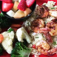 Shrimp Platter · Grilled shrimp served on a bed of rice and two sides.