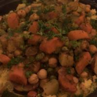 Couscous Royale · A colorful medley of fresh slow-stewed vegetables carrots, zucchini, tomatoes, green peppers...