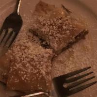 Moroccan Baklava Lunch · Two pieces of famous baklava, sprinkled with powdered sugar. Crisp, lightly honeyed phyllo d...