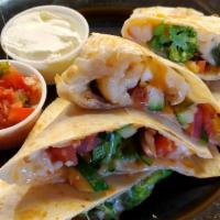 Vegetable Quesadilla · Served with salsa and sour cream.