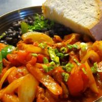 Cajun Jambalaya · Chicken,​ Cajun sausage, peppers, onion, tomatoes, garlic, spicy smoked chili sauce on steam...