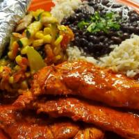 Yucatan Marinated Chicken Breast · Served with rice, beans and Southwestern vegetables. w/corn tortillas