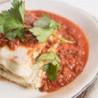 Homemade Lasagna · Noodles layered with ricotta, spinach, mozzarella and choice of sauce.