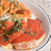 Chicken Parmigiana · Lightly breaded and baked with mozzarella, parmesan, marinara and served with a side of penn...