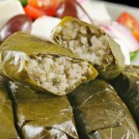Vegetarian Grape Leaves · 8 Veggies, grape leaves, stuffed with tomatoes, onions, parsley, and rice.
