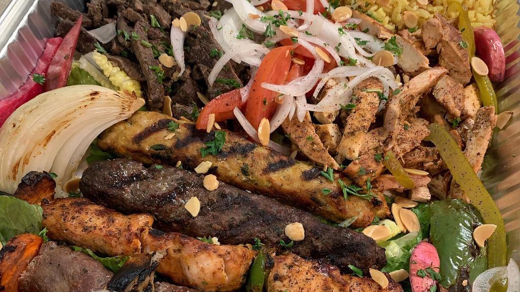 Platter 1 (For 2) · 1 Shish kabob, 1 shish tawook, 1 kafta, 1 chicken kafta, meat and chicken shawarma, 2 falafel, 2 grape leaves, 2 garlic (2oz) & 2 pita bread.