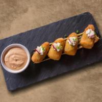 Jalapeno Poppers · Six pieces. Jalapeño peppers that have been hollowed out, stuffed with a mixture of cheese, ...