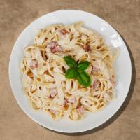  Carbonara Sauce Spaghetti · Made with olive oil and Italian bacon sauteed with onions, tomatoes and asiago cheese. Serve...