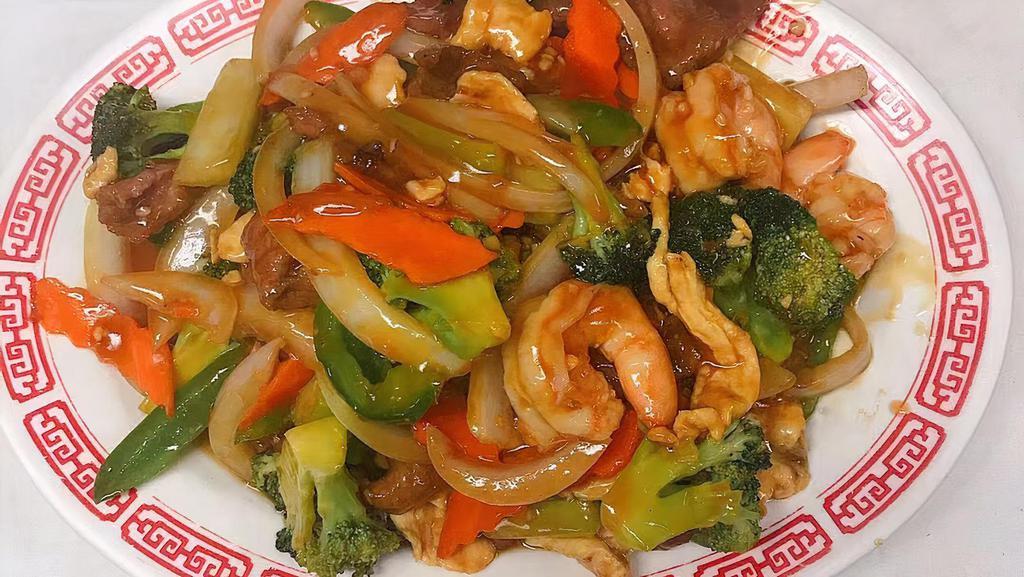 Happy Family · The combination of chicken, beef, shrimp cooked with broccoli, snow pea, carrot, mushroom, water chestnut and baby corn in chef's special sauce.