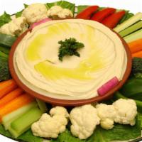 Hommous With Raw Vegetables · Vegan and gluten free. A generous mix of fresh vegetables with our hommous.