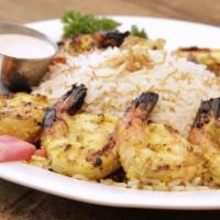 Shrimp Kabob · Gluten free. Jumbo shrimp marinated and char-broiled. Served with choice of 2 sides.