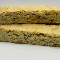 Almond Biscotti · Go nuts!  Almond flavored with fresh sliced almonds baked in.