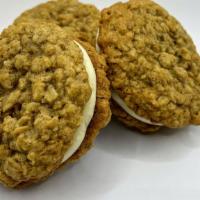 Oatmeal Cream Pie · Our newest hit!  Two soft oatmeal cookies sandwiched together with a marshmallow buttercream...