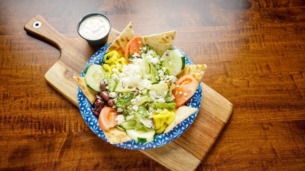 Greek Salad · Dressings: creamy, garlic, cucumber sauce, and oil vinegar.