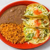 Tamales Dinner · Three tamales made of masa, steamed in a corn leaf. Pollo with chicken in spicy green sauce....