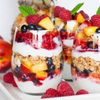 Yogurt Con Fruta  · strawberry, mango or pineapple yogurt, with fresh mango, cantaloupe, strawberries, raspberri...