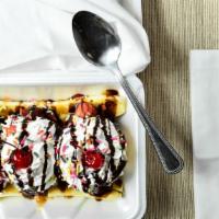 Banana Split · Vanilla ice cream strawberries caramel whipped cream chocolate syrup and sprinkles. choose y...