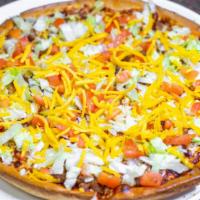 Taco Pizza · Beef, onions, tomatoes, lettuce, cheddar cheese, and Mozzarella cheese.