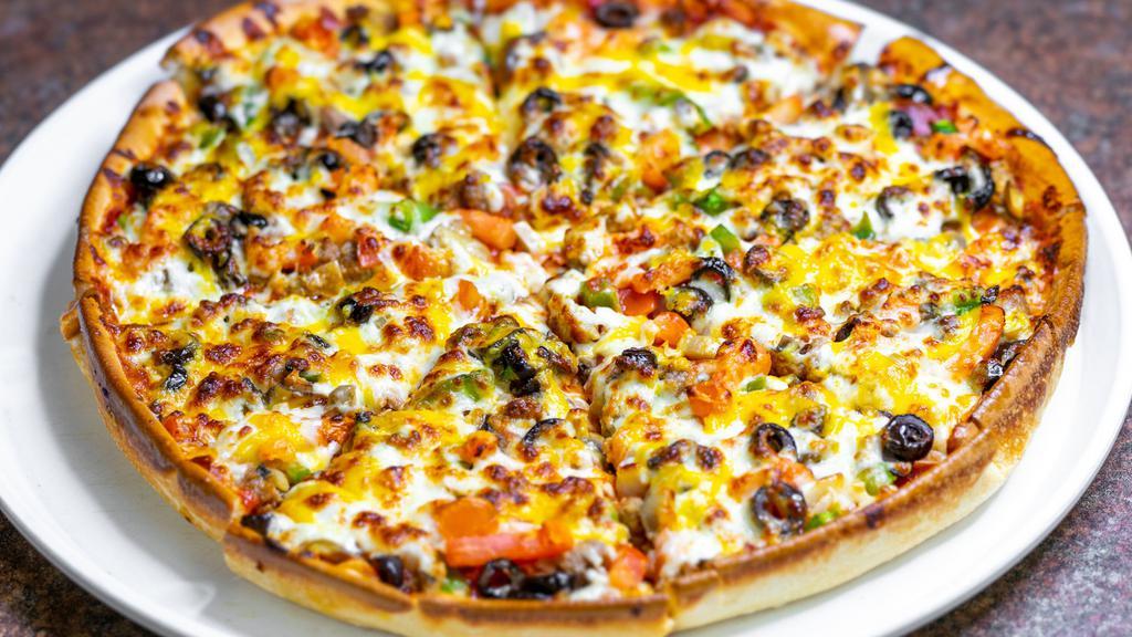 Veggie Pizza · Green peppers, onions, mushrooms, black olives, tomatoes, and Mozzarella cheese.