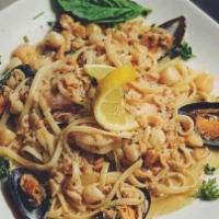 Linguini Tuttomare · New Zealand mussels with jumbo shrimp, sea scallops, and baby clams sautéed in white wine, g...