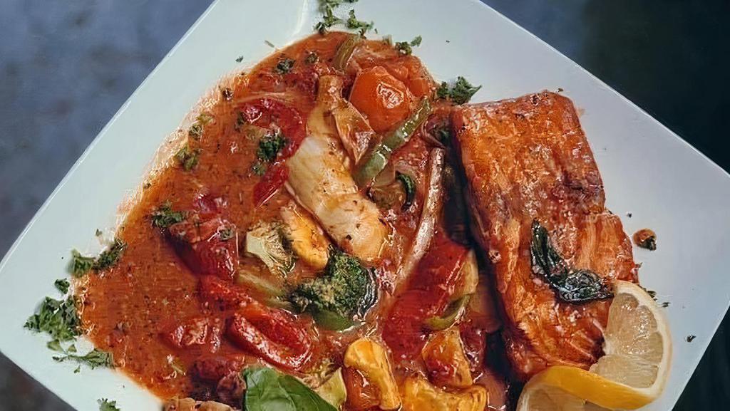 Francesco'S Salmon · Salmon and fresh mixed vegetables in Sherry wine sauce with a touch of marinara served over penne pasta.