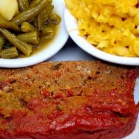 Meatloaf · Two (2) pieces of our Homemade Meatloaf seasoned to perfections and served with two (2) sides.