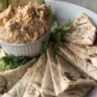 Hummus & Pita · Gluten free option and vegan. A purée of chickpeas, tahini, olive oil, lemon, garlic and a d...