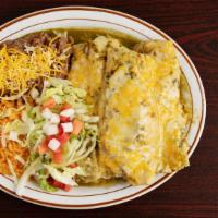 Tamales · Choose chicken, green sauce or rajas, jalapeño and cheese or pork and red sauce topped with ...
