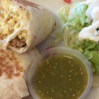 Burrito Poblano · Poblano pepper, egg, onions, quesillo cheese topped with bandera sauce. Served with rice and...