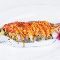 Fire Cracker R · Crab salad and shrimp tempura topped with crabstick and spicy sauce.