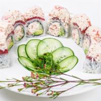 Red Wing R · Crabstick, avocado and cucumber topped with tuna and crab salad.