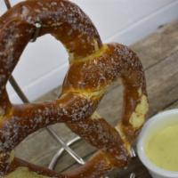 Pretzel & Queso · Giant warmed pretzel served with pepper jack queso.