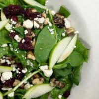Apple Cranberry · Romaine lettuce & spinach, Granny Smith apples, candied walnuts, dried cranberries, bleu che...